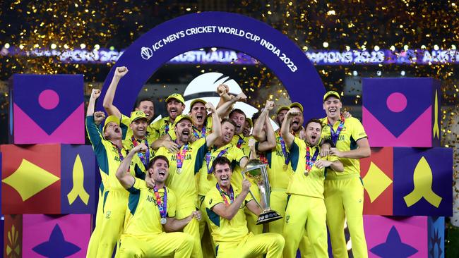 AHMEDABAD, INDIA - NOVEMBER 19: Pat Cummins of Australia lifts the ICC Men's Cricket World Cup Trophy following the ICC Men's Cricket World Cup India 2023 Final between India and Australia at Narendra Modi Stadium on November 19, 2023 in Ahmedabad, India. (Photo by Robert Cianflone/Getty Images)