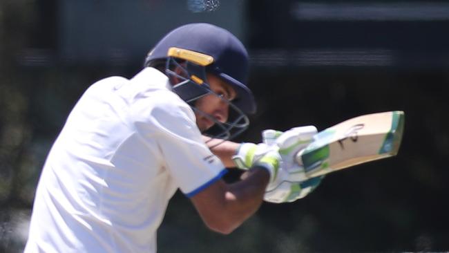 Grade Cricket match between Sturt and Kensington at Price Memorial Oval, Hawthorn. Sturt's Brinder Phagura ducks under a ball from Nicholas Palmer. 3 November 2018. (AAP Image/Dean Martin)