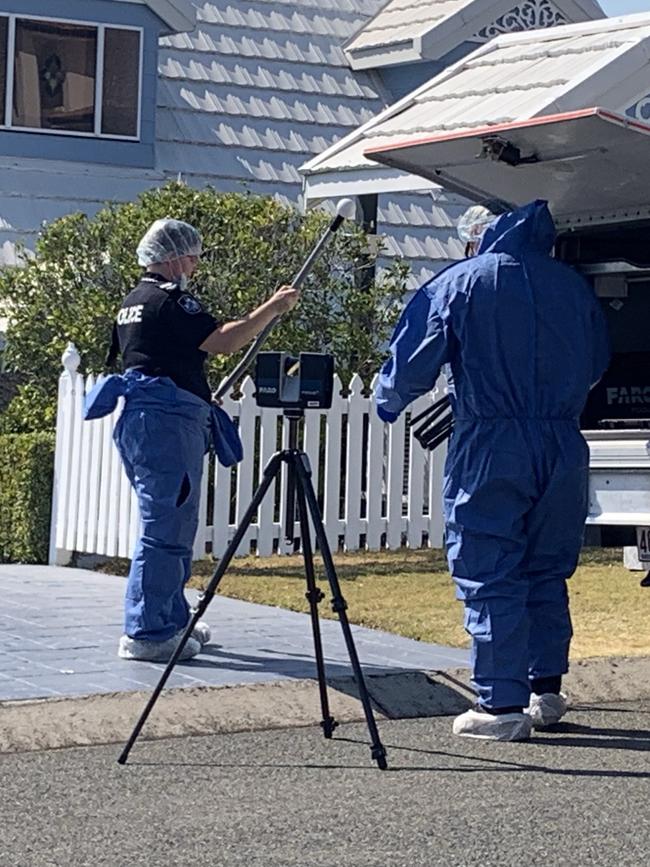 Police use 360 degree cameras to map the scene. Picture: Emily Halloran.