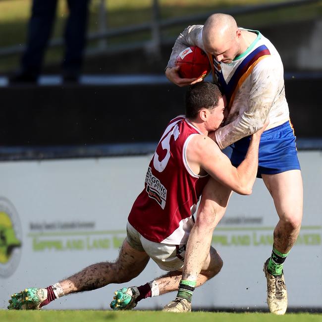 Moe star Riley Baldi is tackled by Traralgon’s Lucas Tripodi.