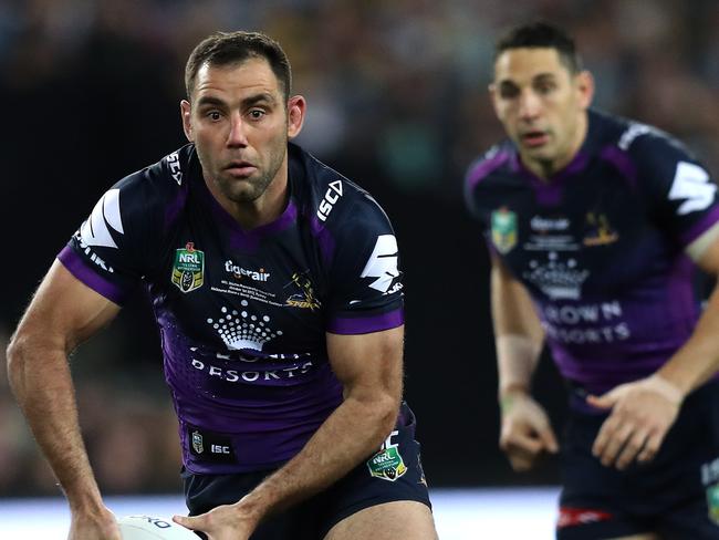 Melbourne's Cameron Smith looks to offload watched by team mate Billy Slater during the 2017 NRL Grand Final between the Melbourne Storm and the North Queensland Cowboys at ANZ Stadium, Sydney. Picture: Brett Costello