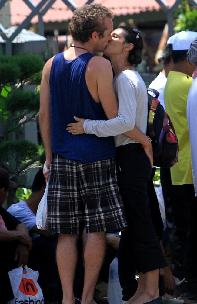 David Taylor shares an affectionate kiss with girlfriend Sara Connor inside Kerobokan Jail before she leaves for court. Picture: Lukman S. Bintoro