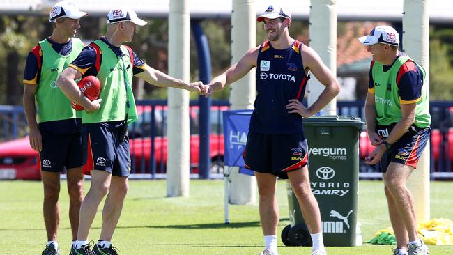 New Adelaide coach Phil Walsh knuckles with Ricky Henderson. Picture: Sarah Reed