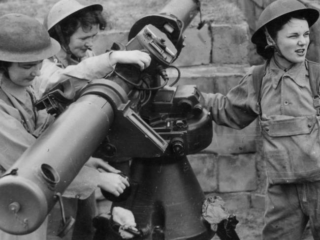 For the first time in Victoria, women manned anti-aircraft stations. Copyright: Herald Feature Service, Melbourne