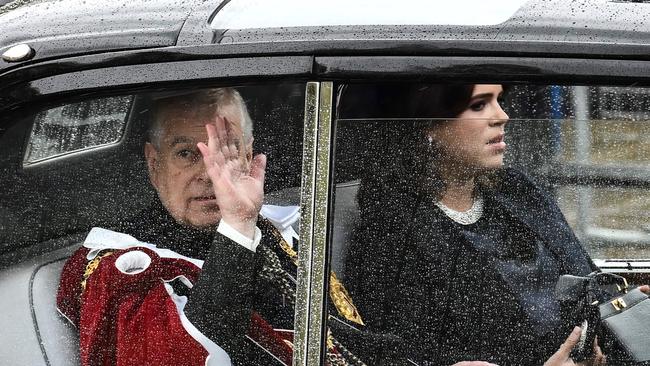 Prince Andrew, Duke of York, leaves Buckingham Palace with daughter Princess Eugenie. Picture: Marco Bertorello/AFP