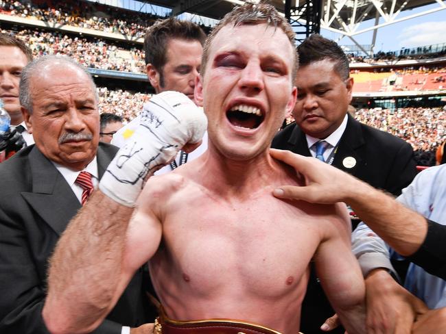 BRISBANE, AUSTRALIA - JULY 2: Jeff Horn (C) of Australia celebrates beating Manny Pacquiao of the Philippines in their WBO welterweight championship title fight at Suncorp Stadium on July 2, 2017 in Brisbane, Australia.  (Photo by Bradley Kanaris/Getty Images)