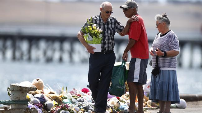 Melissa Little’s elderly parents visit the memorial on the Port Lincoln wharf. Picture: Dean Martin