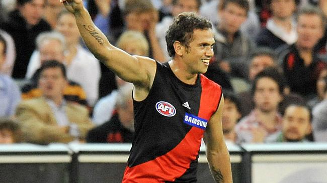 Mark Williams celebrates one of his five goals as a Bomber.