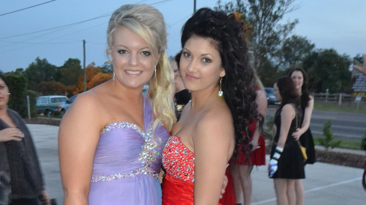 Grace Pobar and Sharni Barron enjoying the night at the Roma State College formal. Photo Rebecca George / The Western Star