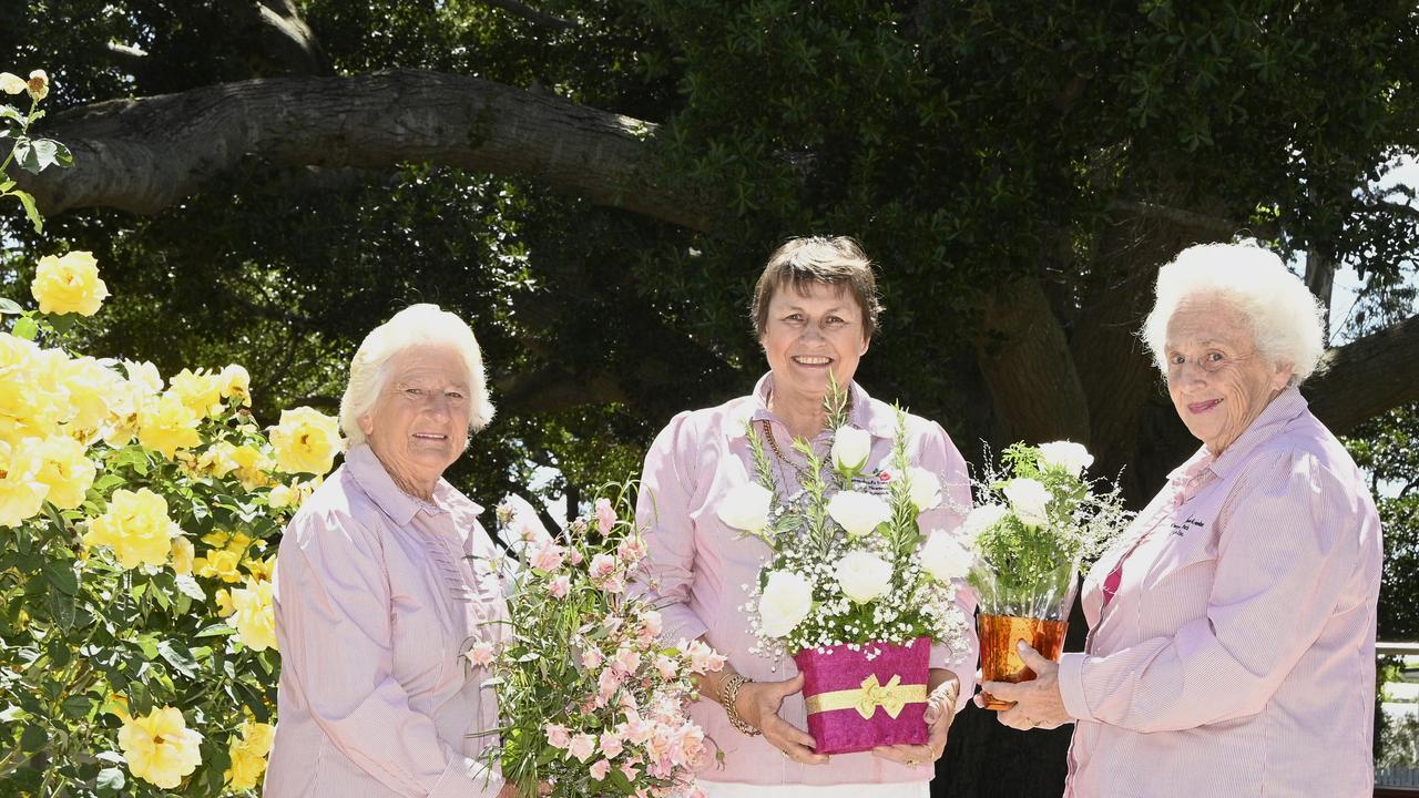 President of Queensland State Rose Garden in Newtown Park, Sandy Martin (centre) with members Shirley Cronk (left) and Heather Palmer. The group prepare for Valentines Day making arrangements and potting roses either bought in from nurseries or from their personal gardens.