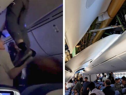 Watch: Passenger Stuck in Overhead Bin Following Severe Turbulence