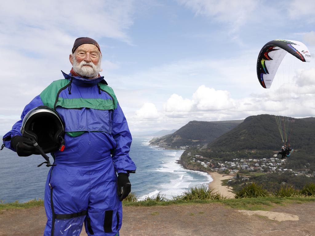 Pictured at popular paragliding spot Stanwell Tops south of Sydney, Jos Bots, 93, is already Australia’s oldest pilot – but so far the Guinness World Record eludes him. Picture: Jonathan Ng