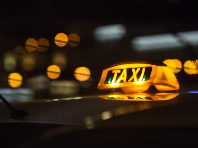 Generic taxi at night.