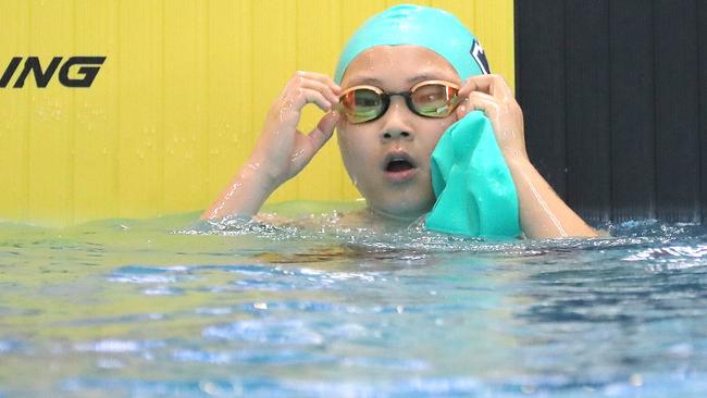 Sunny Kito of Narrabeen competing in the Boys 10 100m Breaststroke.