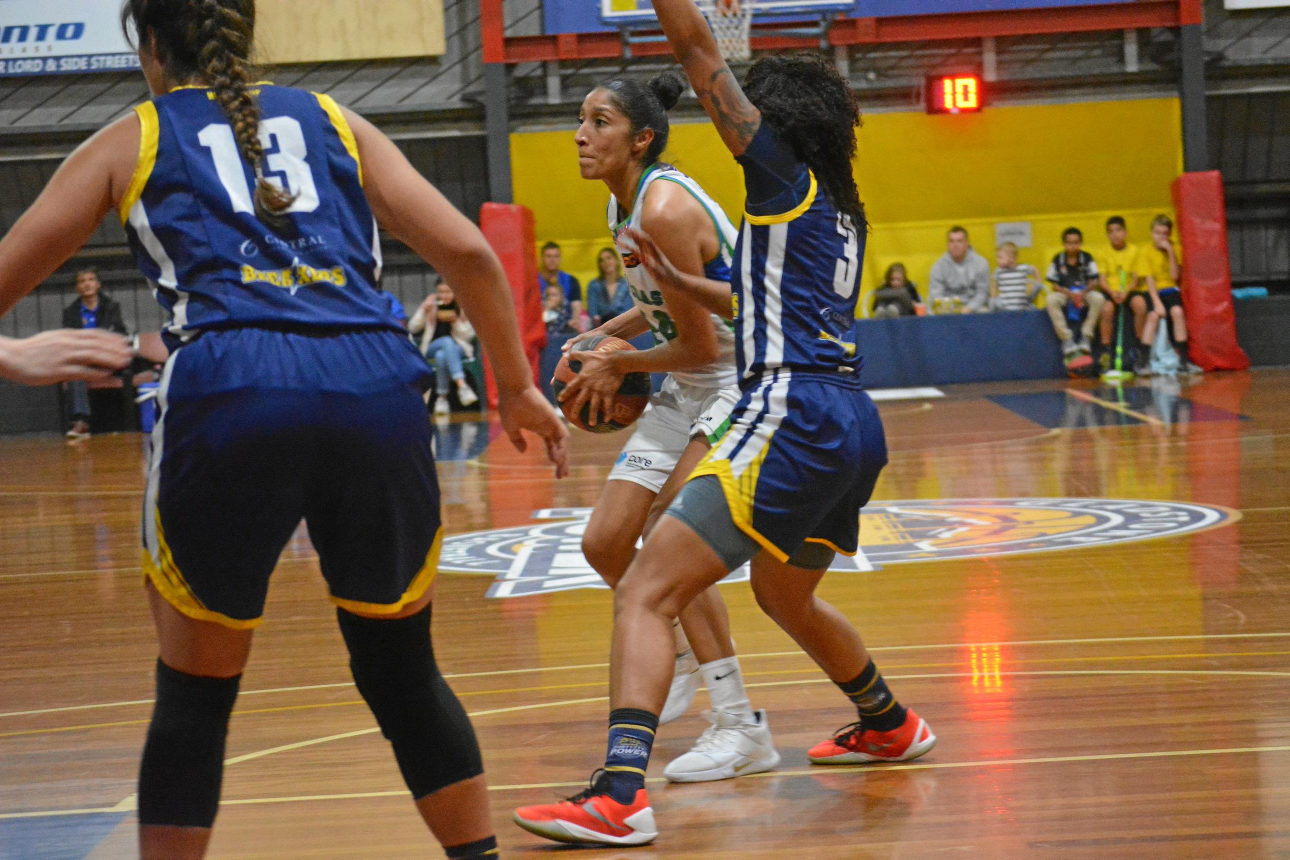 Akilah Bethel guards a Rollers player. Picture: Nick Kossatch GLA040819QBL