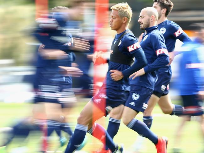 MELBOURNE, AUSTRALIA - DECEMBER 05:  Keisuke Honda runs during a Melbourne Victory A-League training session at Gosch's Paddock on December 5, 2018 in Melbourne, Australia.  (Photo by Robert Prezioso/Getty Images)