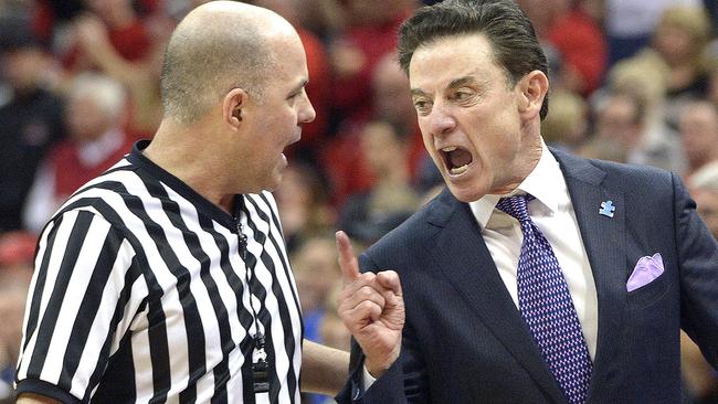 Louisville head coach Rick Pitino, right, argues with a referee during a game in 2016.