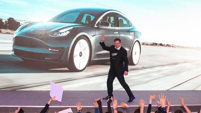 Tesla CEO Elon Musk danced on stage as he presented first batch of made-in-China cars to ordinary buyers on January 7. Picture: AFP