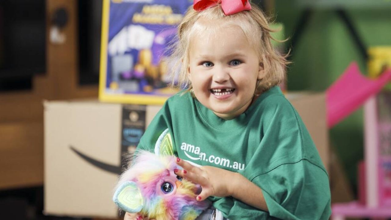 This cutie is excited to meet a Furby that’s for sure. Picture: Amazon Australia