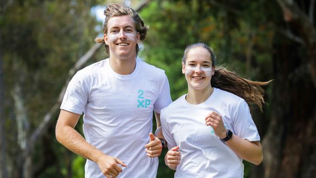 Carlton recruit Will Setterfield and cousin and AFLW Bulldogs star Isabel Huntington. Picture: Nicole Cleary