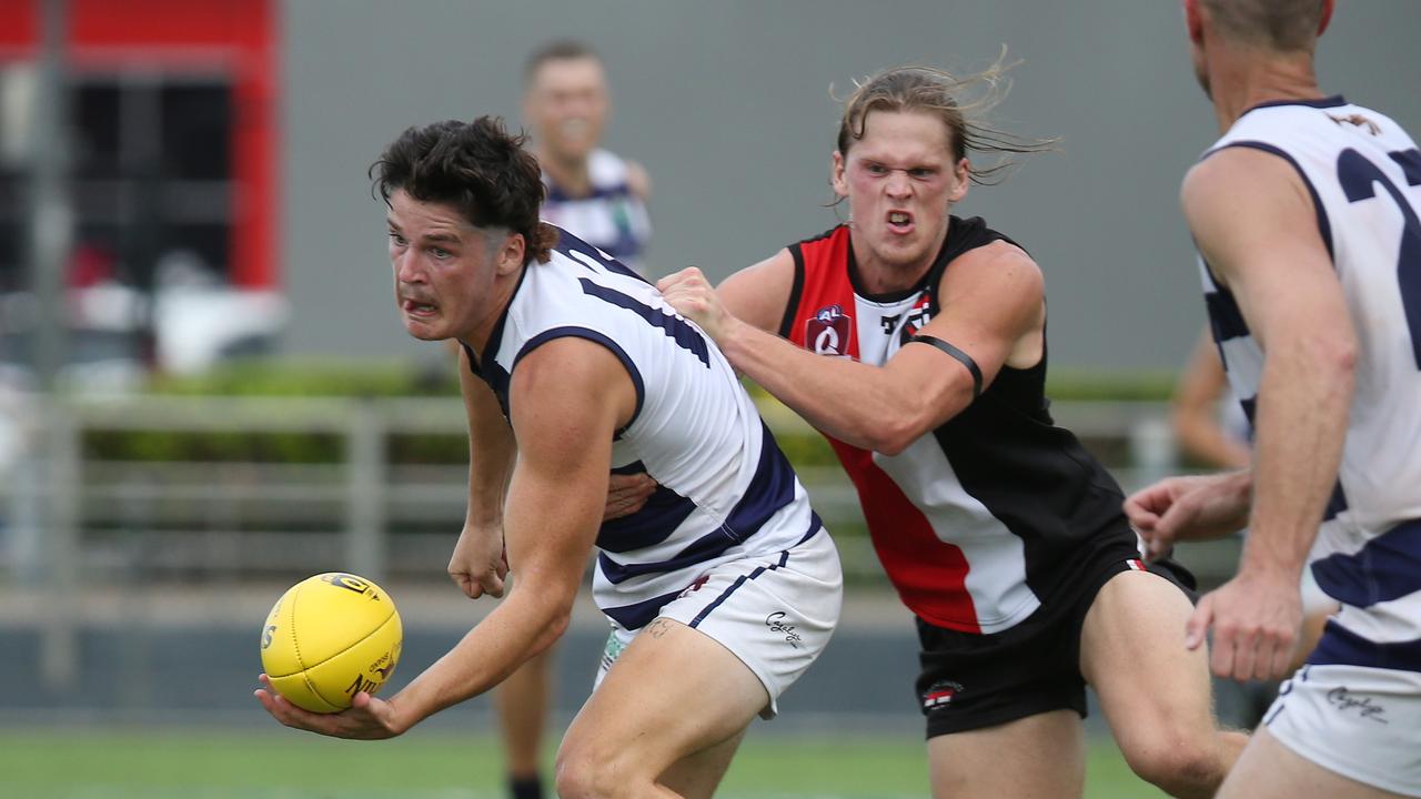 Saints' Jack Antonio manages to offload the ball in the AFL Cairns seniors semi final match between the Cairns Saints and the Port Douglas Crocs, held at Cazalys Stadium, Manunda. Picture: Brendan Radke