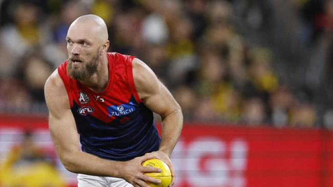 MELBOURNE , AUSTRALIA. April 24, 2024.  AFL.. Anzac Eve.  Richmond vs Melbourne at the the MCG.   Max Gawn of the Demons runs away from Richmonds Toby Nankervis during the 2nd qtr.    . Pic: Michael Klein