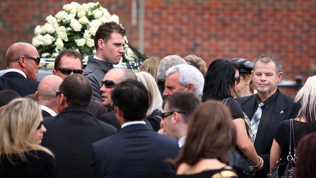 George (far right). Carl Williams’ funeral at St Therese's church, Essendon.