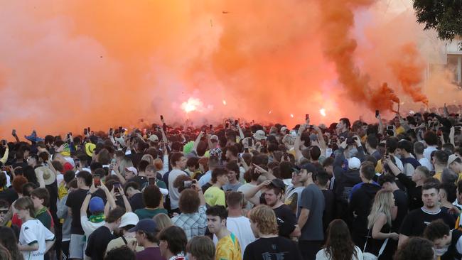 Two people were taken to hospital with burns after flares were lit in Federation Square. Picture: NCA NewsWire / David Crosling