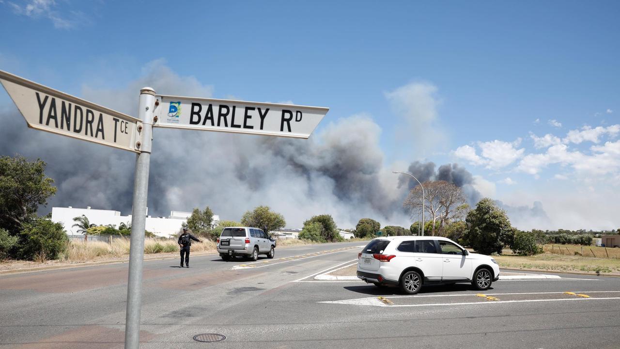 Multiple roads were closed as the fire tore through bushland. Picture: Robert Lang