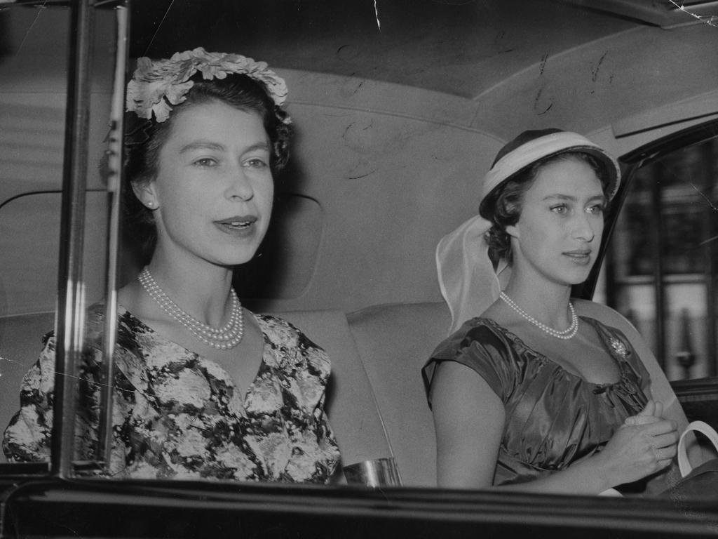 Queen Elizabeth II and Princess Margaret drive from Buckingham Palace on their way to the first day's meeting of Royal Ascot. (Photo by PA Images via Getty Images)