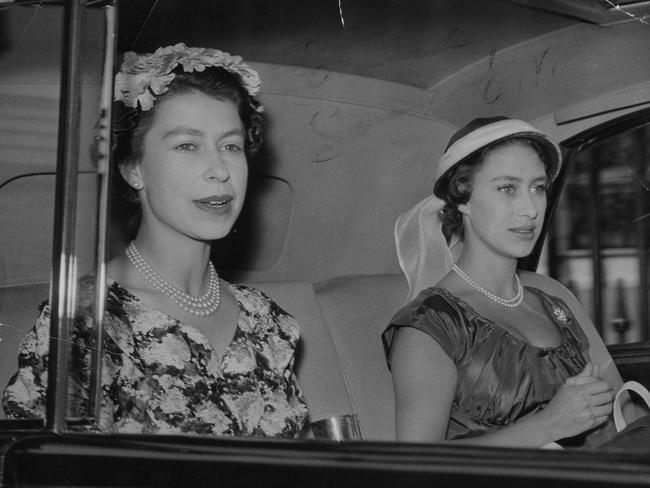 Queen Elizabeth II and Princess Margaret drive from Buckingham Palace on their way to the first day's meeting of Royal Ascot. (Photo by PA Images via Getty Images)