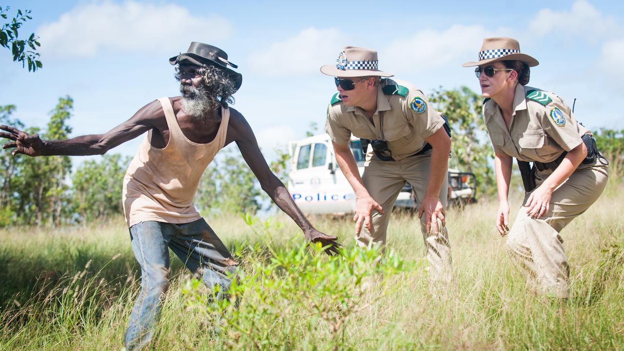 David Gulpilil, with actors playing police officers in Rolf de Heer's Charlie's Country, for which he won a Cannes Film Festival Best Actor award.