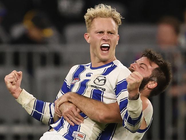 PERTH, AUSTRALIA - JULY 12: Jaidyn Stephenson of the Kangaroos celebrates a goal during the round 17 AFL match between the West Coast Eagles and North Melbourne Kangaroos at Optus Stadium on July 12, 2021 in Perth, Australia. (Photo by Paul Kane/Getty Images)