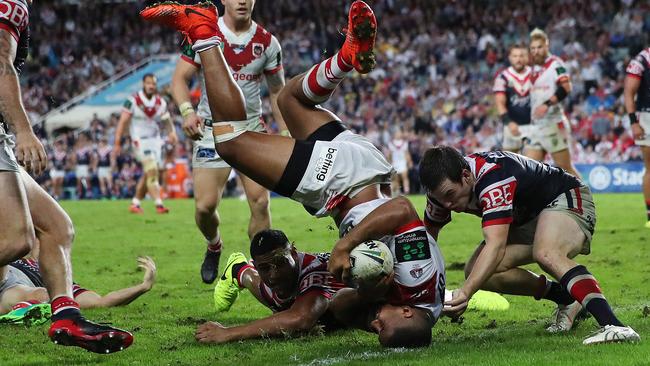 St George's Nene Macdonald scores try on his head. Photo: Phil Hillyard