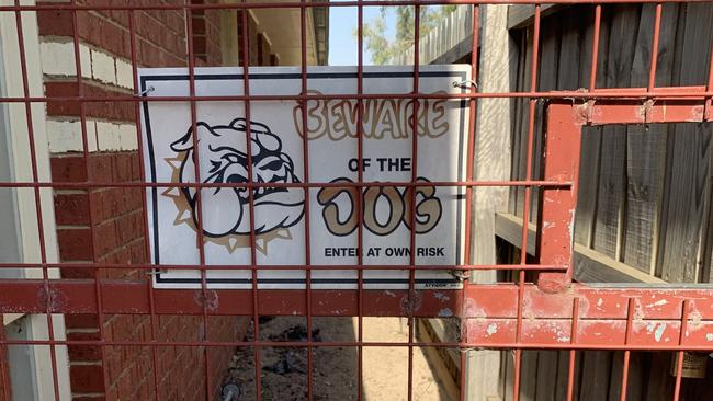 A sign at the home where a girl was attacked by greyhound in Cranbourne West.