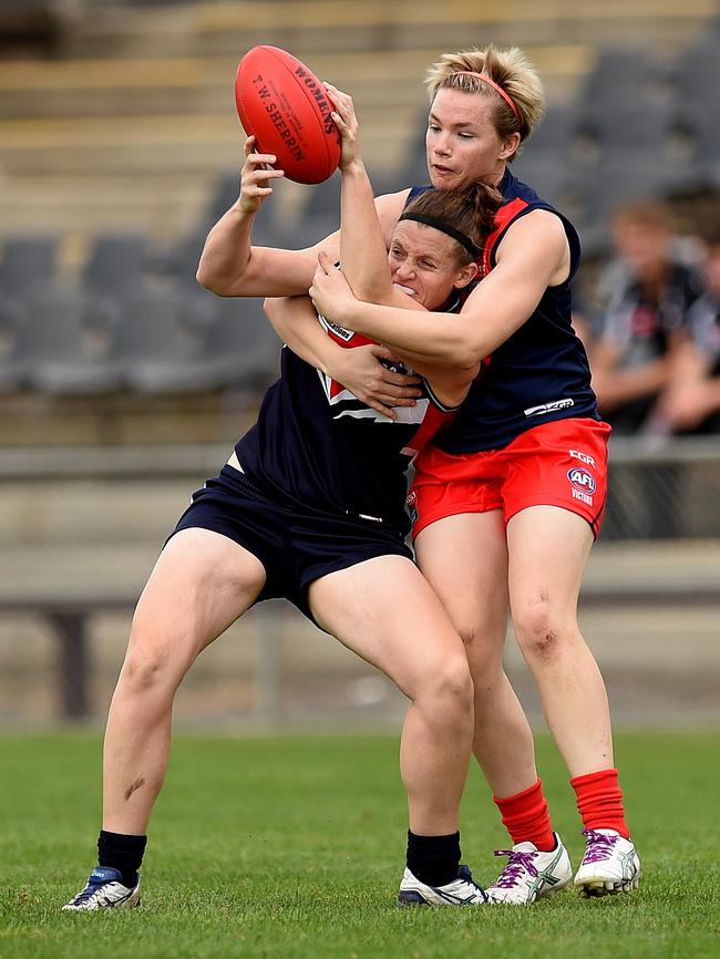 Darebin Falcons’ Kate Tyndall is caught by Diamond Creek’s Jessica Cameron on Saturday. Picture: David Smith