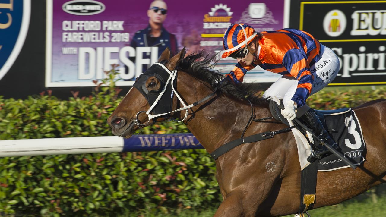 Spartan Jet and Skye Bogenhuber complete their victory in today’s Class 1 Plate at Clifford Park. Picture Kevin Farmer