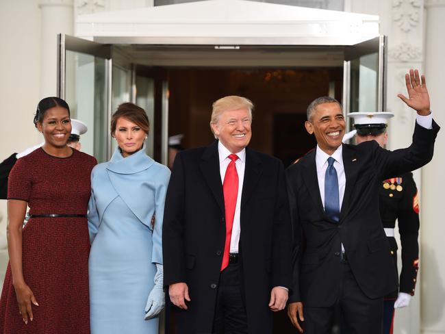 US President Barack Obama and First Lady Michelle Obama welcome Preisdent-elect Donald Trump and his wife Melania to the White House in Washington, DC January 20, 2017. Picture: AFP