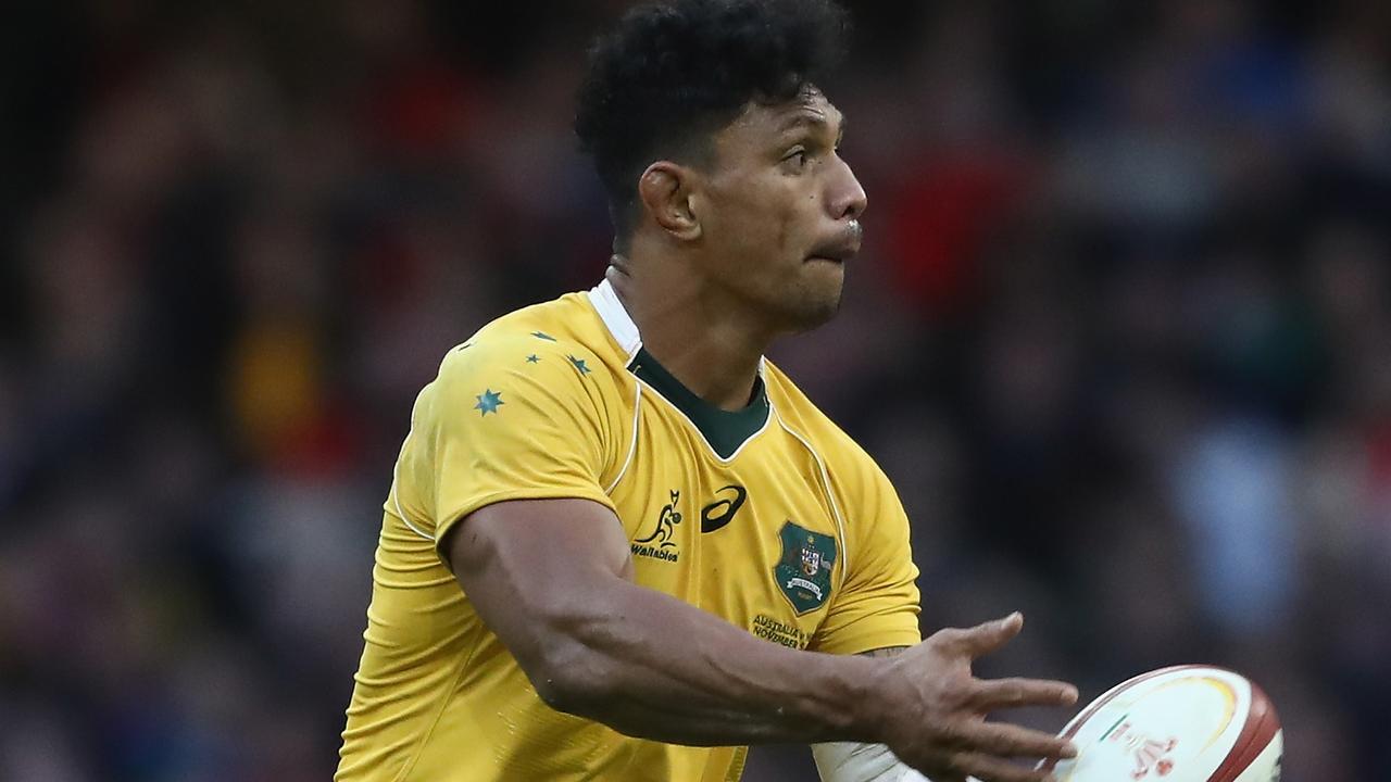 Lopeti Timani of the Wallabies offloads at the Principality Stadium in Cardiff.