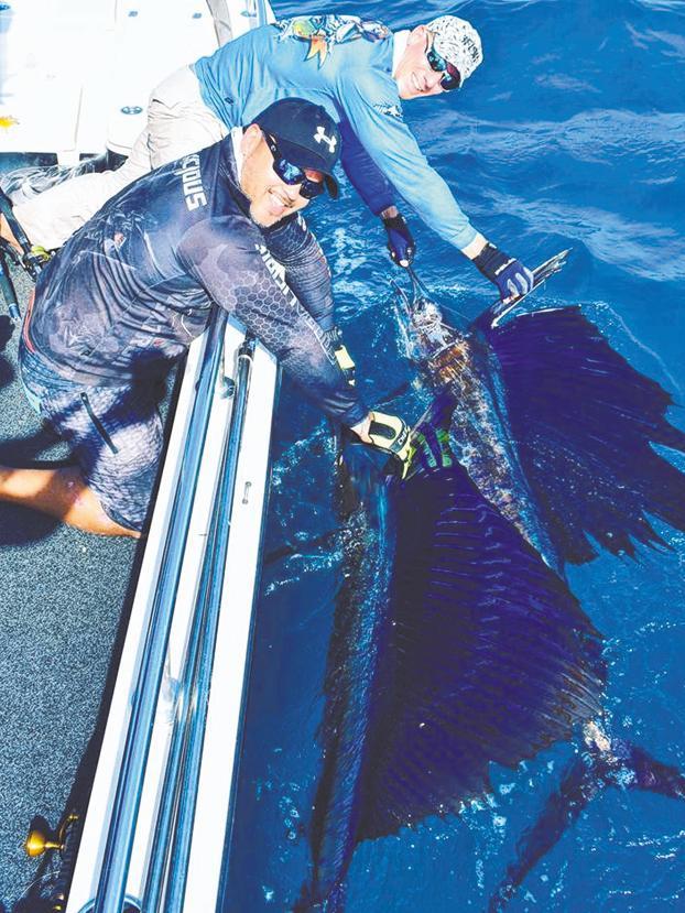 Nathan Corpus (left) and Shane Compain with their first sailfish success fishing Dundee wide this week. Shane acknowledged the mentoring from champion billfish angler, Doug Saunders.