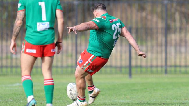 The magic moment Josh McConnell kicks a field goal from 35m to win the game for the Corrimal Cougars 1st Division. Picture: Steve Montgomery | OurFootyTeam