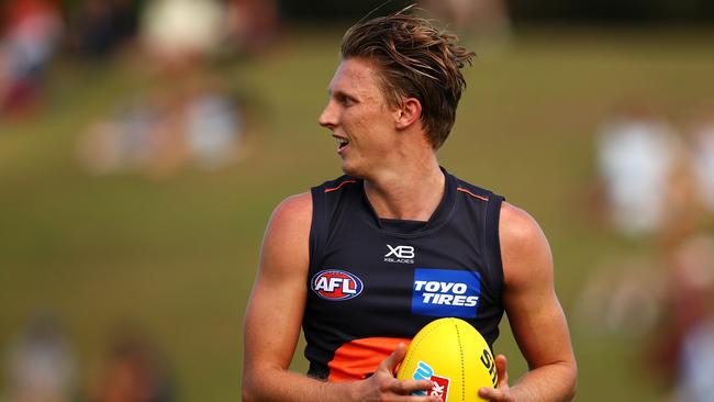 Lachie Whitfield is hot property after his score of 170 against Carlton. Picture: Mark Kolbe/Getty Images.