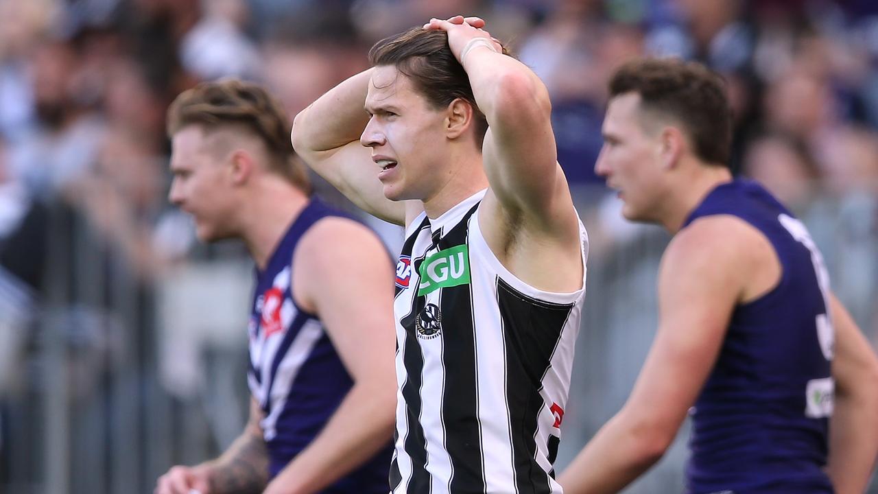 Tom Langdon looks on during a game against Fremantle in Round 23.