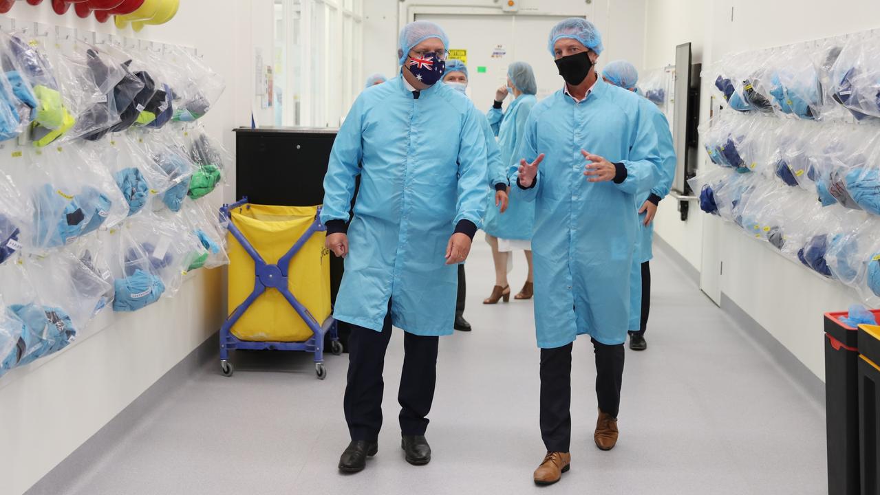 Prime Minister Scott Morrison and Health Minister Greg Hunt pictured at a plan handling the AstraZeneca Covid-19 vaccine in Melbourne. Picture: Adam Taylor PMO Via NCA NewsWire