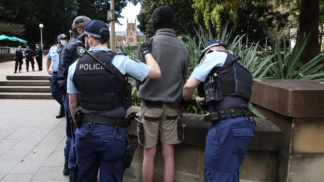 A man is arrested during the operation. Picture: NSW Police
