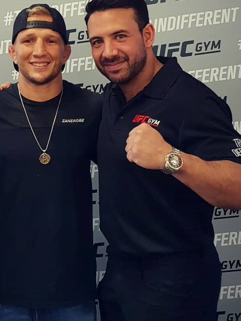 Karim Girgis with UFC fighter TJ Dillashaw.