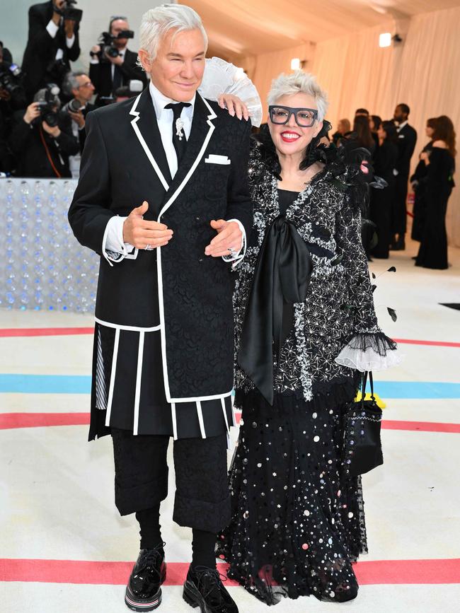 Catherine Martin wearing Australian label Romance Was Born and her husband, Baz Luhrmann. Picture: AFP