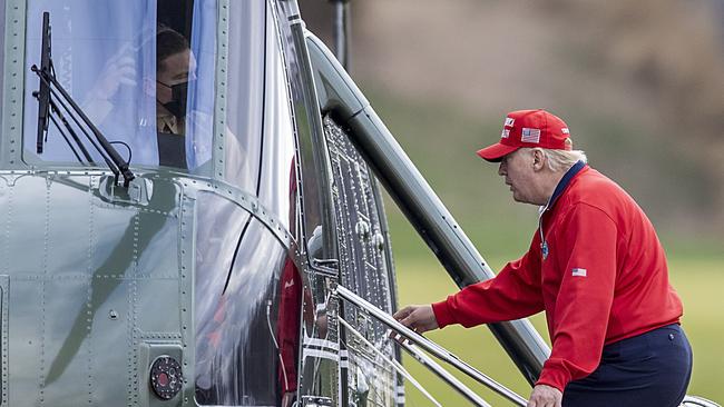 Donald Trump boards Marine One at his golf club in Sterling, Virginia, for the trip back to the White House. Picture: AFP