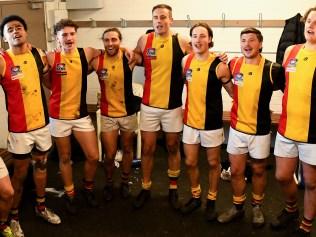 Cheltenham players sing the song in the rooms after winning the Southern Football Netball League 2023 Division 1 Senior match between St Paul's McKinnon and Cheltenham at McKinnon Reserve in McKinnon, Victoria on July 8, 2023. (Photo by Josh Chadwick)