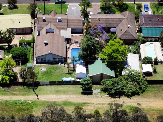 Aerial view of homes surrounded by bushland at Picton in southwestern Sydney.